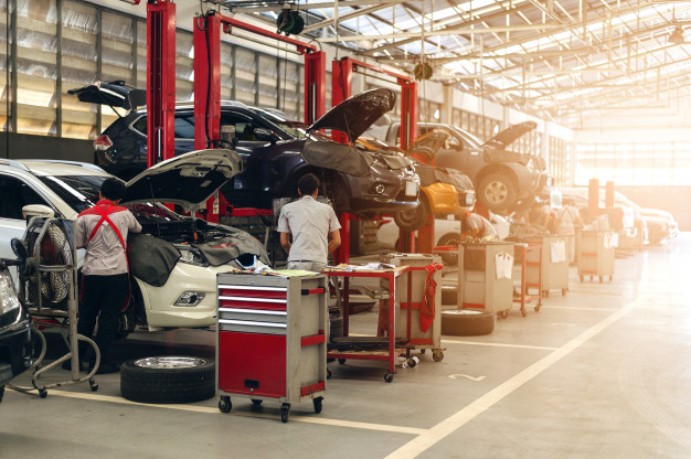 mechanic-working-car-maintenance_41050-2402